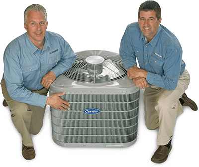Kurt and Tom next to an air conditioning unit | Ductworks HVAC Services in Southington, CT